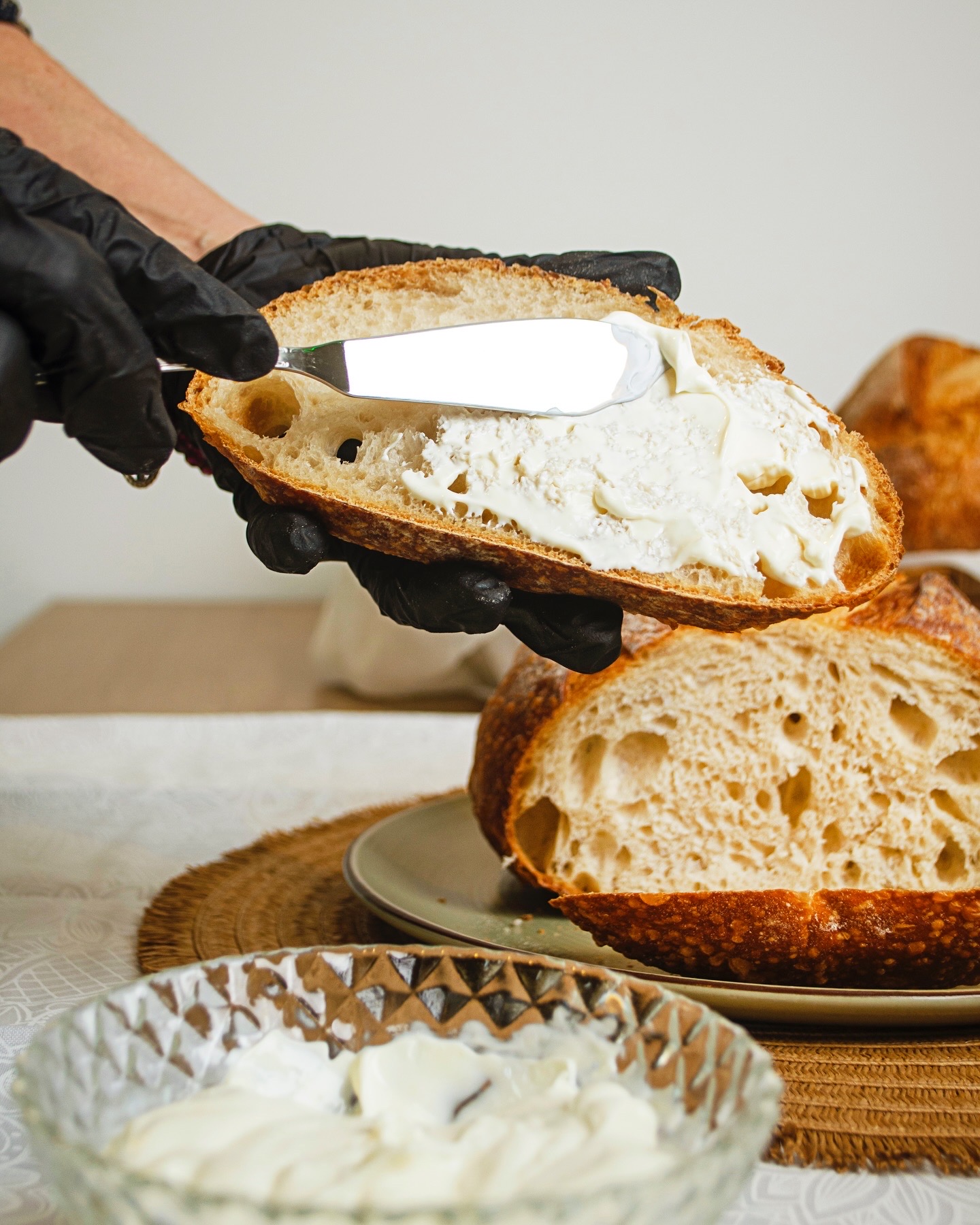 Butter spread over a slice of artisan sourdough bread